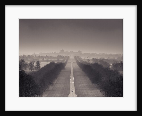 England, Berkshire, Aerial view of two people walking on long path with windsor castle in background by Assaf Frank